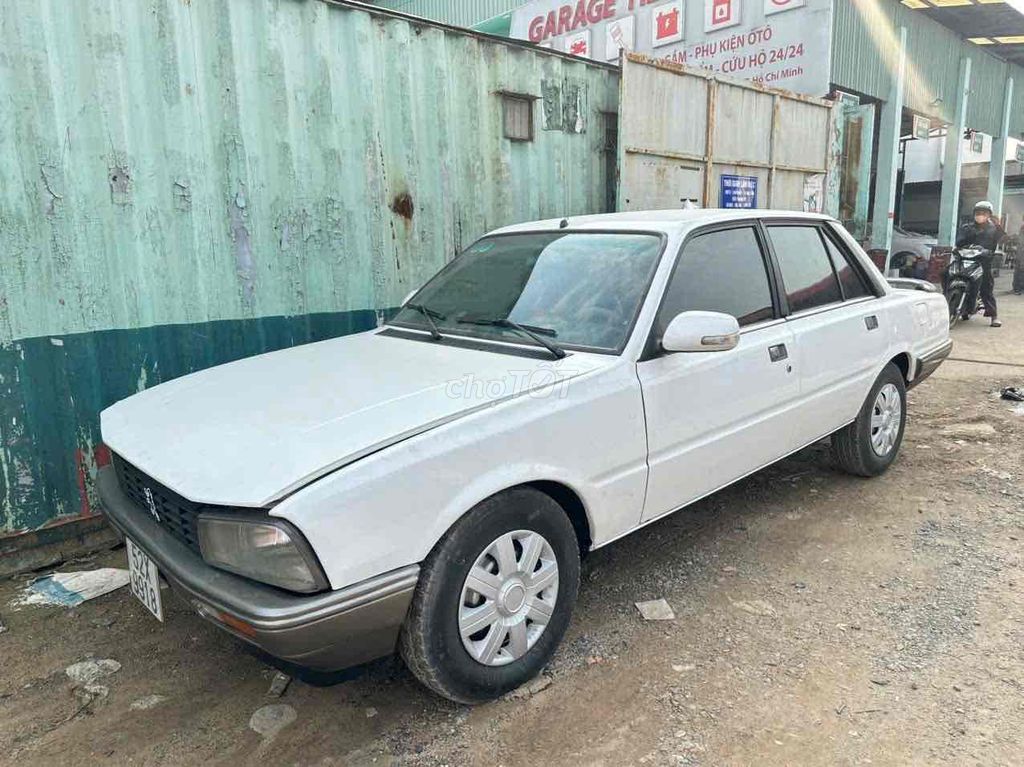 Peugeot 505 2002 Trắng 5 chỗ. Mua bán Ô tô tại Quận Bình Tân Tp Hồ Chí Minh được đăng bởi kiên hình 2