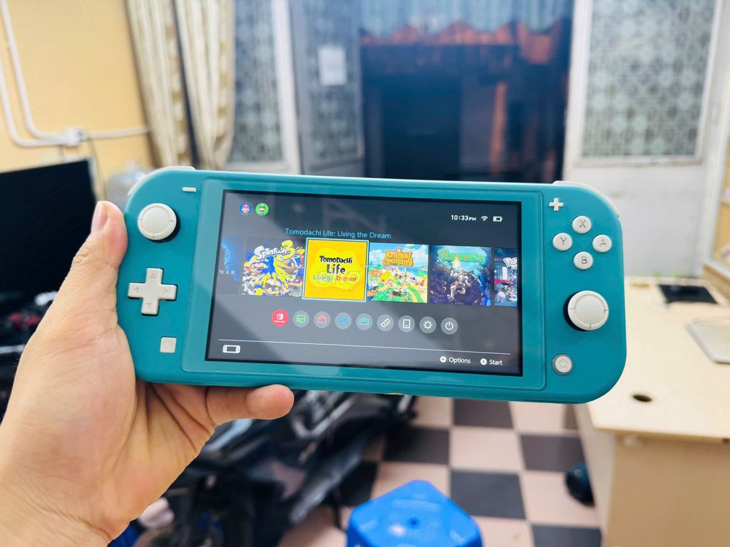 Máy chơi game Nintendo Switch Lite Xanh hắc 128gb. Mua bán Thiết bị chơi game tại Quận Đống Đa Hà Nội được đăng bởi Tú Dybala hình 1