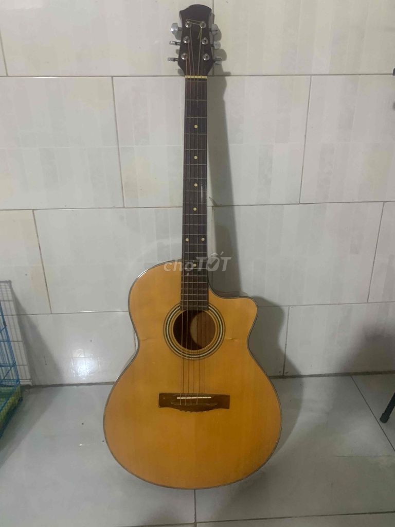 Guitar gỗ. Mua bán Nhạc cụ tại Quận 7 Tp Hồ Chí Minh được đăng bởi Phạm Tuấn Dũng hình 1