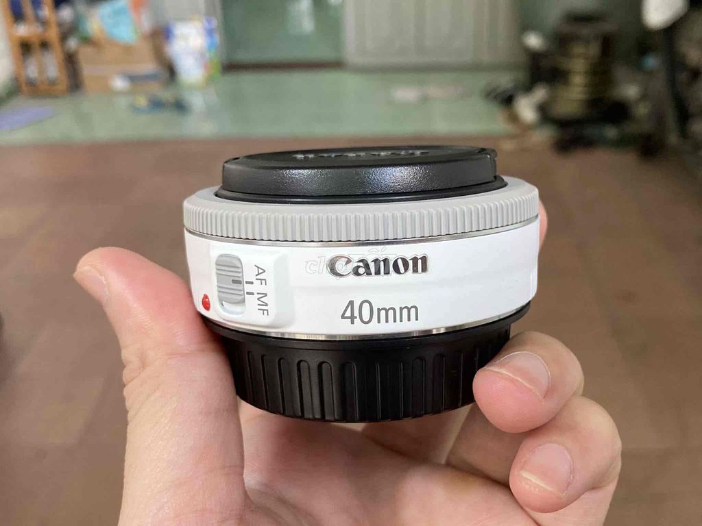 Ống kính Canon EF 40mm f/2.8 STM màu Trắng. Mua bán Máy ảnh, Máy quay tại Quận 12 Tp Hồ Chí Minh được đăng bởi Samstag hình 1