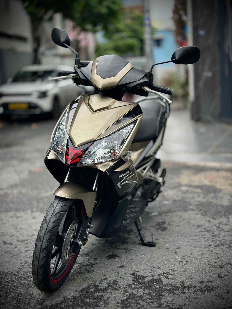 Honda Air Blade 2010 золотисто-бронзовый