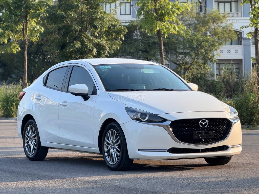 Mazda 2 Luxury model 2021 màu trắng sedan. Mua bán Ô tô tại Quận 12 Tp Hồ Chí Minh được đăng bởi Xuân Trường hình 1