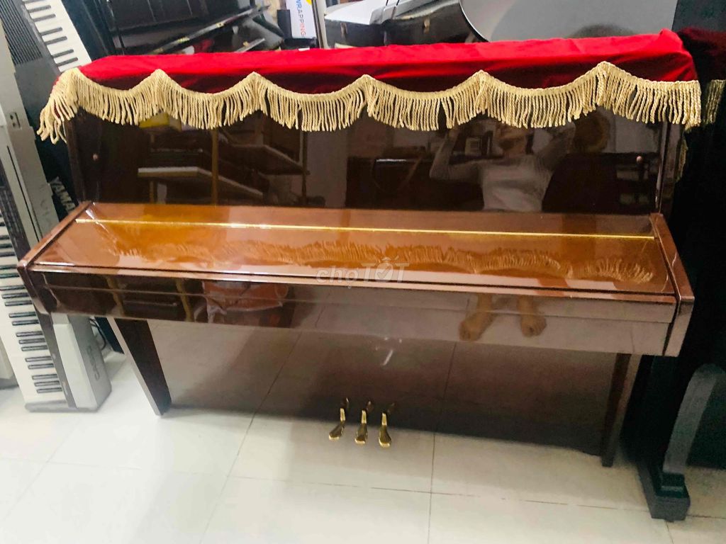 piano cơ kawai ce7