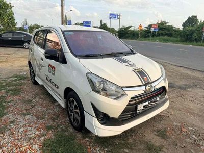 Toyota Wigo 2024 Trắng Tự động 5 chỗ