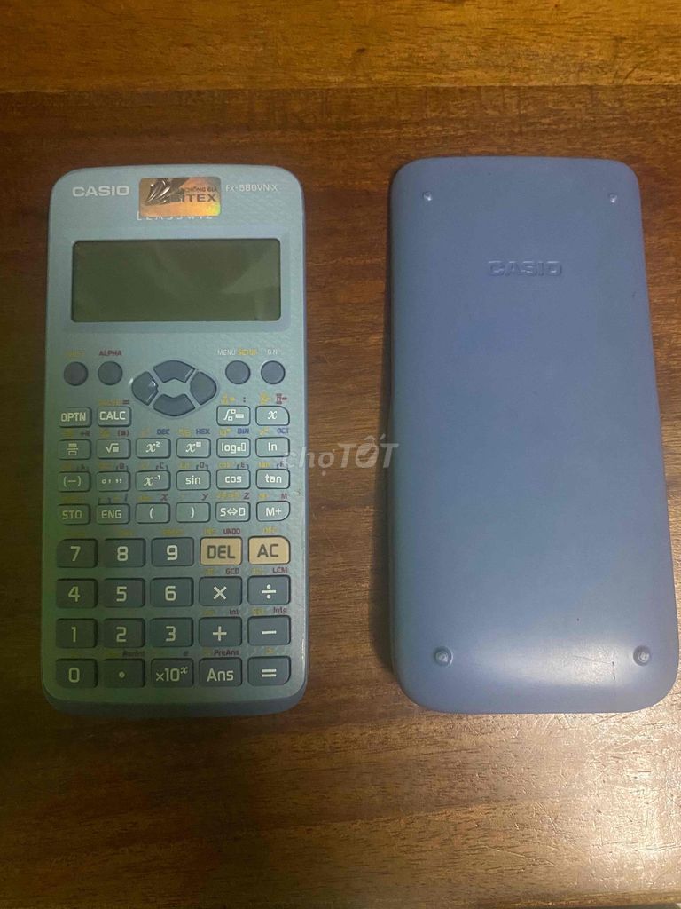Máy tính casio fx 580VNX màu xanh có 2 máy