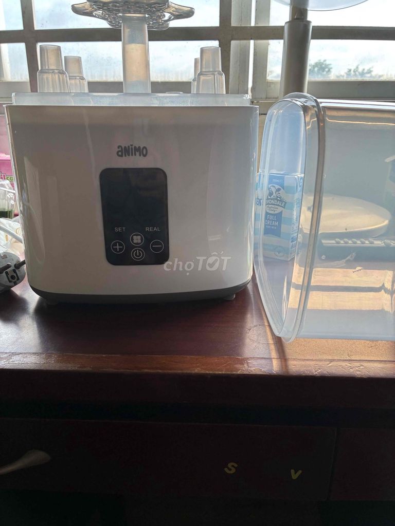 Máy tiệt trùng bình sữa Animo Trắng. Mua bán Mẹ và bé tại Quận 6 Tp Hồ Chí Minh được đăng bởi Ngọc hình 1