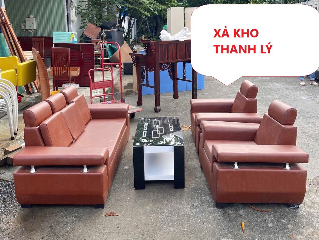 Bán rẻ Bộ ghế sofa bọc da màu nâu kèm bàn còn đẹp