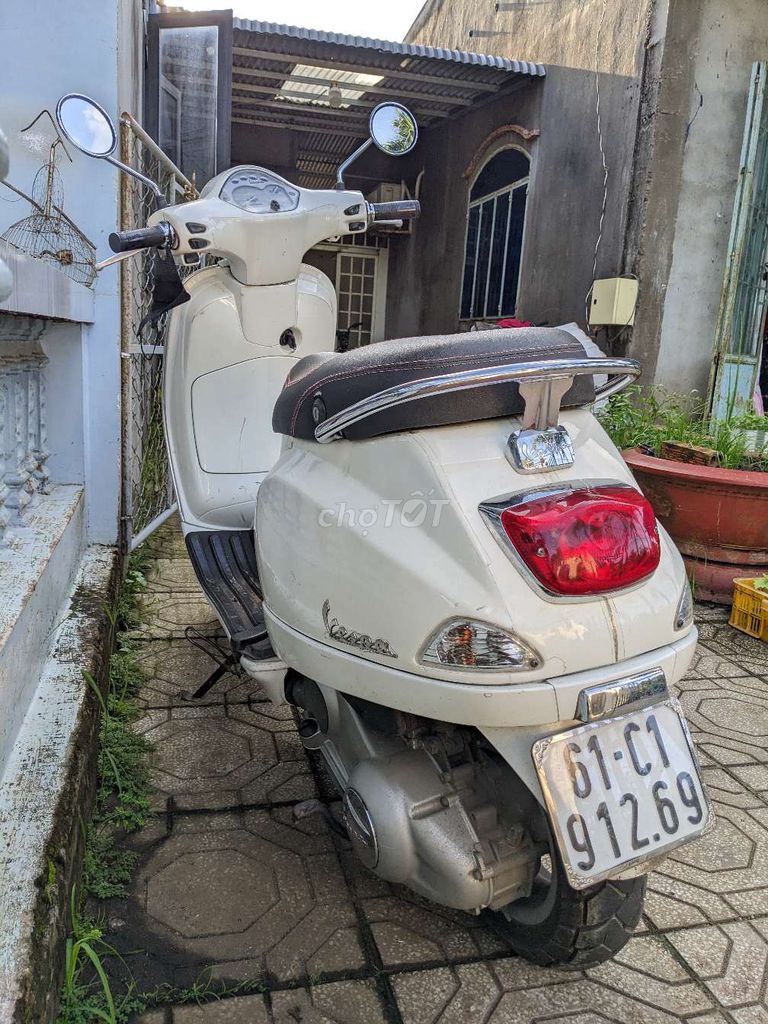 Piaggio Vespa LX 150 màu Trắng kim phun. Mua bán Xe máy tại Thành phố Thuận An Bình Dương được đăng bởi xuân lộc hình 3
