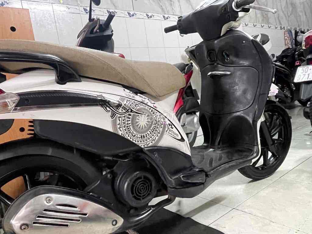 Белый бензин Piaggio Liberty Fi