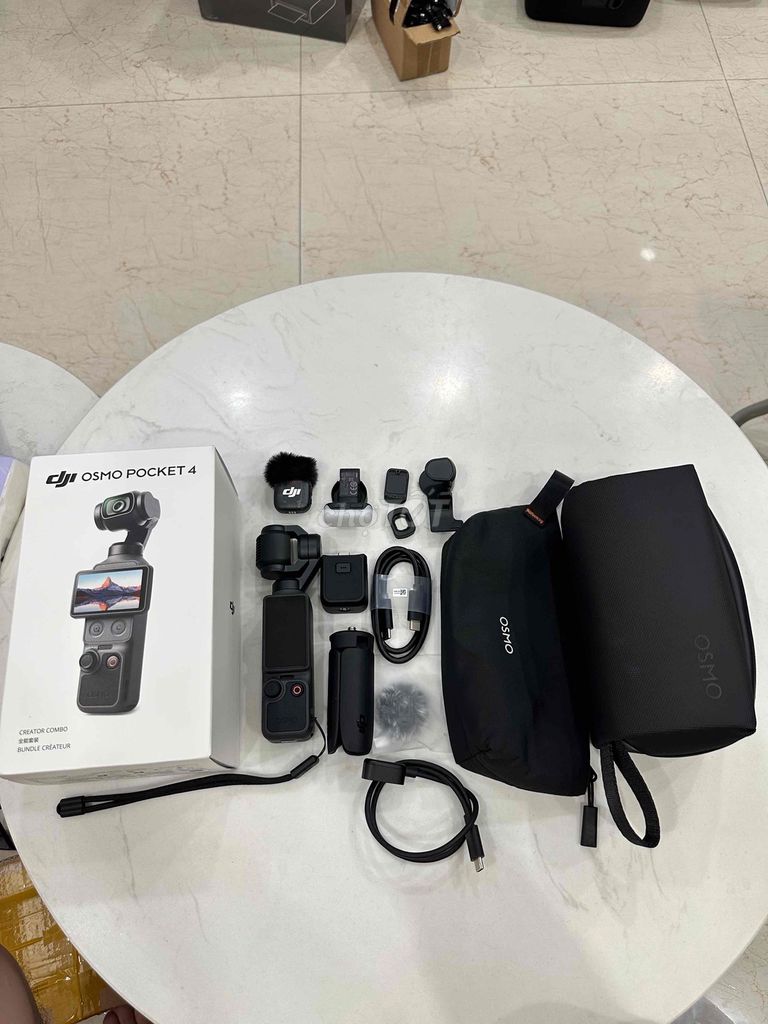 DJI Osmo Pocket 4 Combo like new. Mua bán Máy ảnh, Máy quay tại Quận Gò Vấp Tp Hồ Chí Minh được đăng bởi Than hình 1