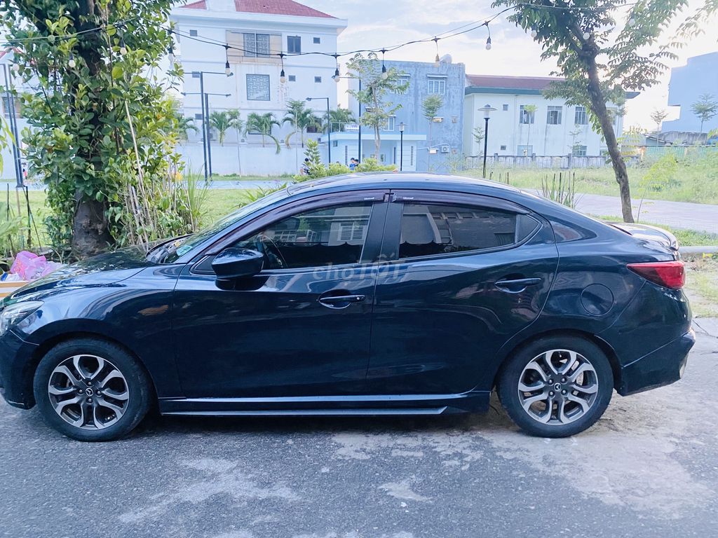 Mazda 2 2016  1.5 AT Sedan - 100000 km