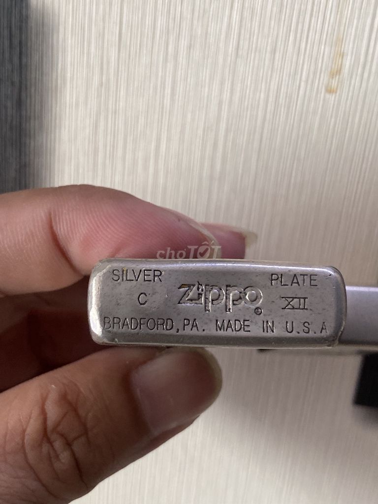 Zippo cổ độc lạ. Bạc. Giao lưu tất cả.xe cộ.đthoai