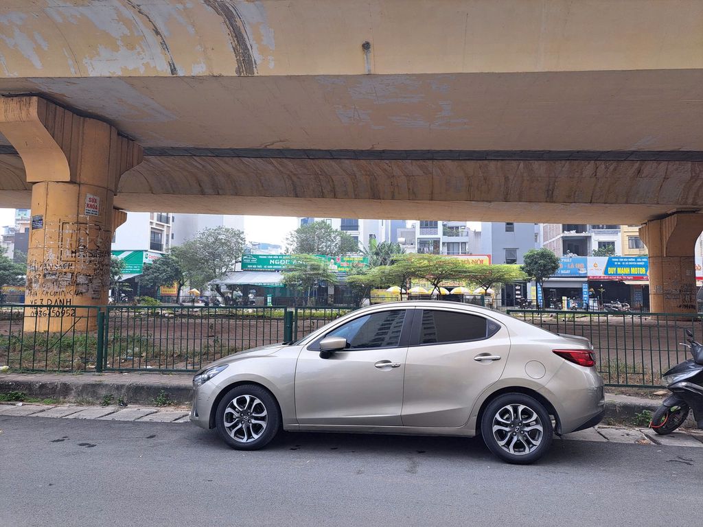 Mazda 2 Vàng cát. Mua bán Ô tô tại Quận Hà Đông Hà Nội được đăng bởi Lê Thanh Tài hình 4