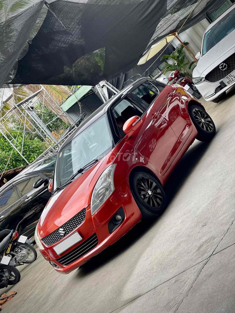 Suzuki Swift 2015 Tự động 130.000 km Đỏ zin đẹp