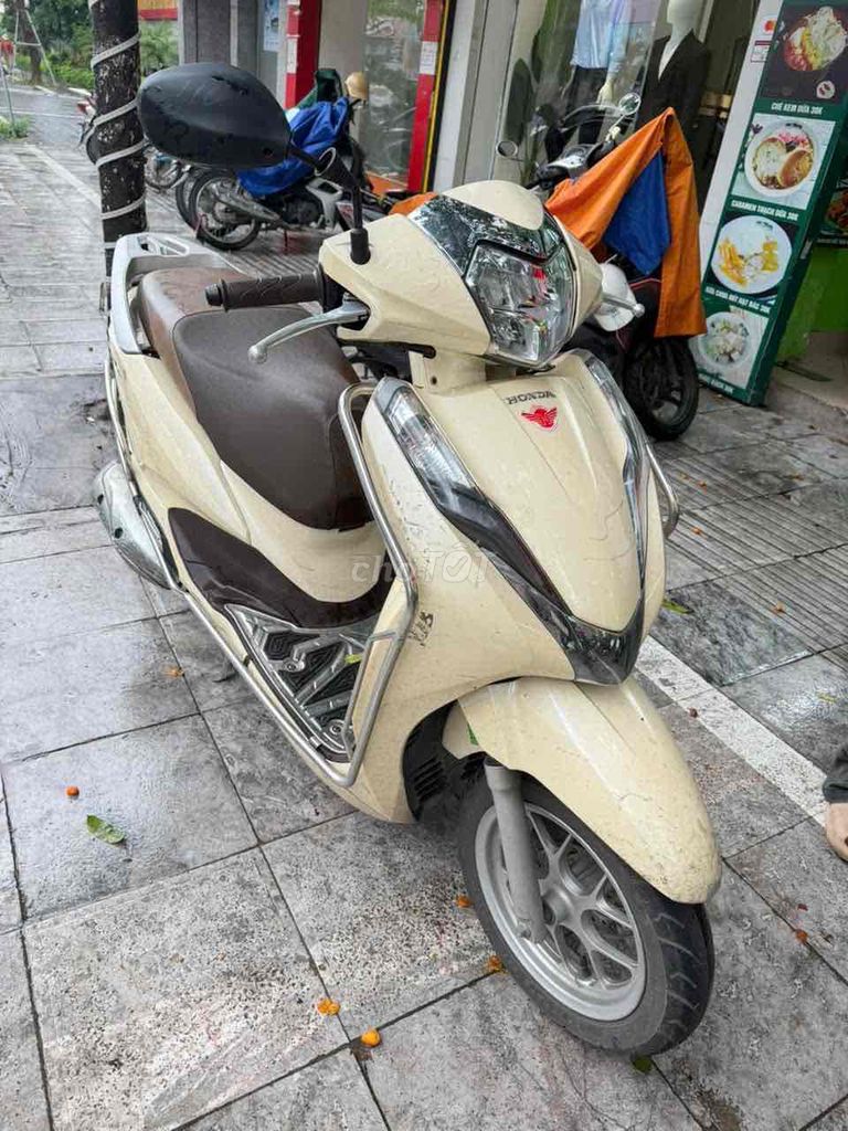 Женская кремовая одежда Honda Lead 2020