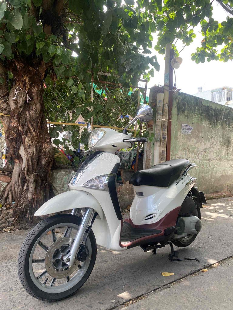 Piaggio Liberty Fi 125 3Vie 2014 trắng Zin100%. Mua bán Xe máy tại Quận Bình Tân Tp Hồ Chí Minh được đăng bởi Anh khuê hình 4