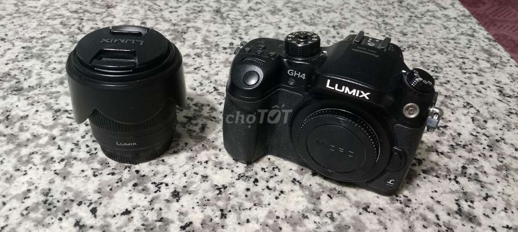 máy ảnh lumix gh4 kèm len 12 - 42 f3.5 còn fix giá