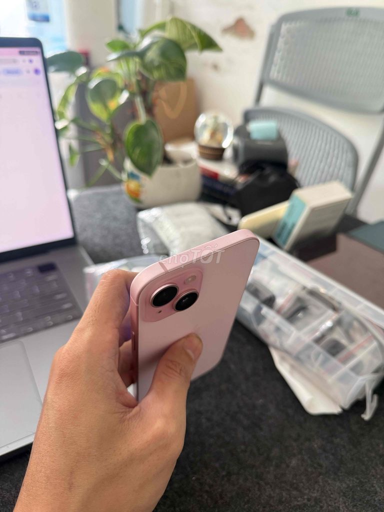 iPhone 15 Hồng qt 2 sim vật lý. Mua bán Điện thoại tại Quận Bình Thạnh Tp Hồ Chí Minh được đăng bởi Táo Care  hình 1