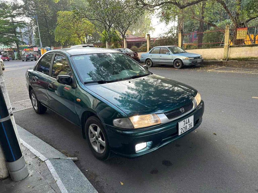 Mazda 323 2000 GLX 1.6MT - 252211 km. Mua bán Ô tô tại Thành phố Thủ Dầu Một Bình Dương được đăng bởi Ô TÔ CŨ BÌNH DƯƠNG hình 11