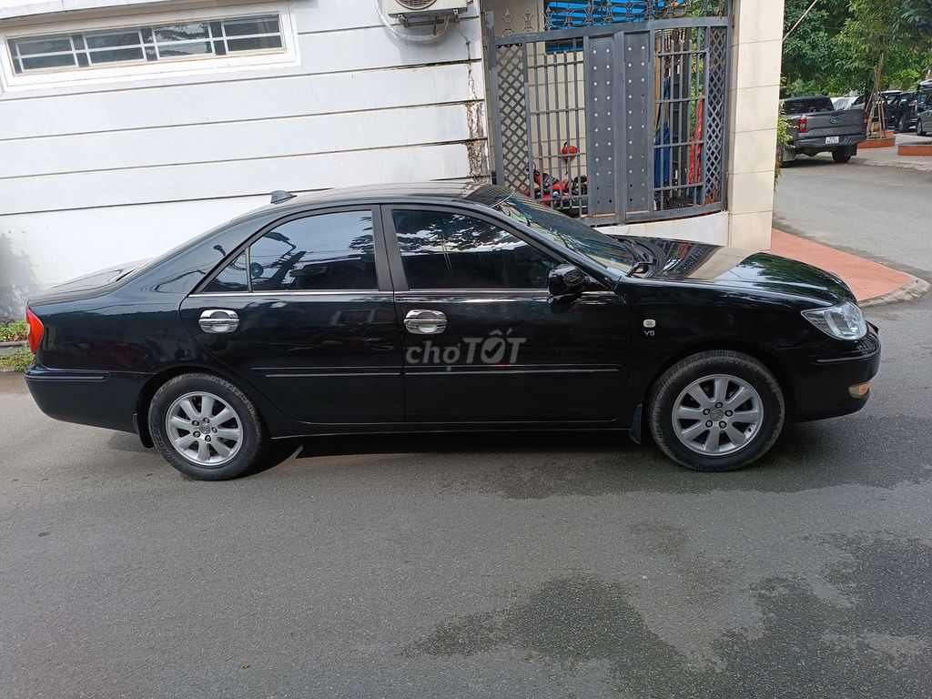 Toyota Camry 3.0V model 2004 màu đen cọp. Mua bán Ô tô tại Quận Gò Vấp Tp Hồ Chí Minh được đăng bởi Việt 8080 hình 4