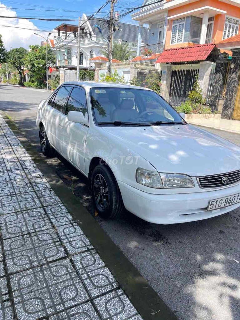 Toyota Corolla 1.6 Trắng 5 chỗ. Mua bán Ô tô tại Thành phố Bến Tre Bến Tre được đăng bởi Phương Bến Tre hình 2