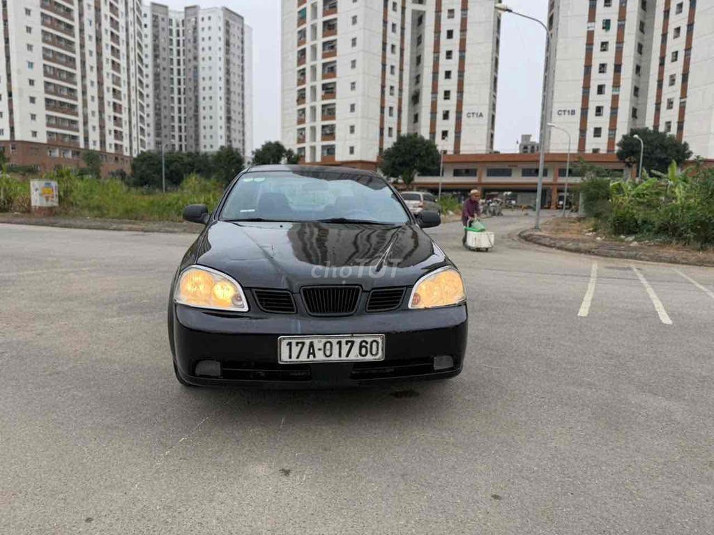 Lacetti 2004 Đen Số sàn. Mua bán Ô tô tại Quận Cầu Giấy Hà Nội được đăng bởi Ánh Minh hình 1