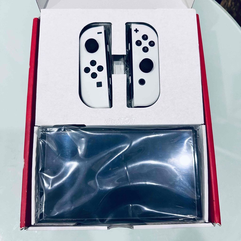 Nintendo Switch OLED Trắng Noheck fullbox. Mua bán Thiết bị chơi game tại Quận 8 Tp Hồ Chí Minh được đăng bởi school stone hình 1