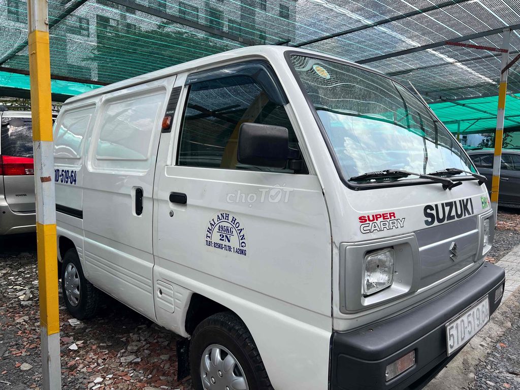 Suzuki Super Carry белый грузовой фургон 2 места