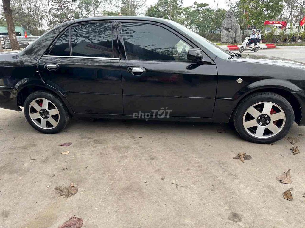 Ford Laser 2003 Ghia 1.8 - 300000 km