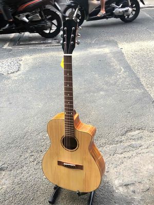 Guitar acoustic gỗ ép bảo hành 1 năm