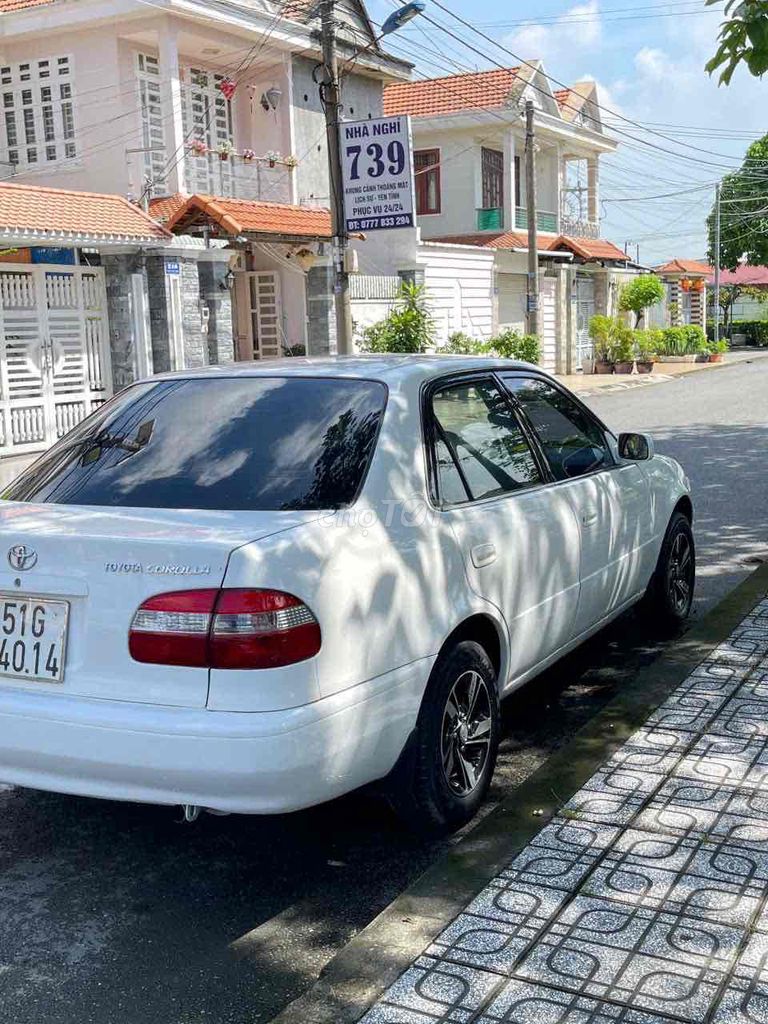 Toyota Corolla 1.6 Trắng 5 chỗ. Mua bán Ô tô tại Thành phố Bến Tre Bến Tre được đăng bởi Phương Bến Tre hình 5