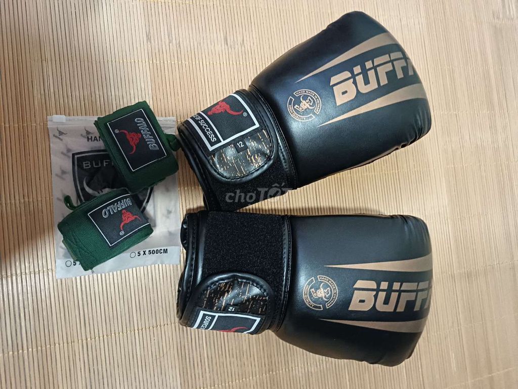 Găng tay boxing BUFF Đen Da 12 oz. Mua bán Đồ thể thao, Dã ngoại tại Quận Đống Đa Hà Nội được đăng bởi Hằng Mun hình 1