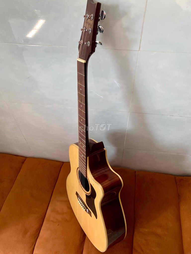 Guitar hạt dẻ cần bán tại tphcm