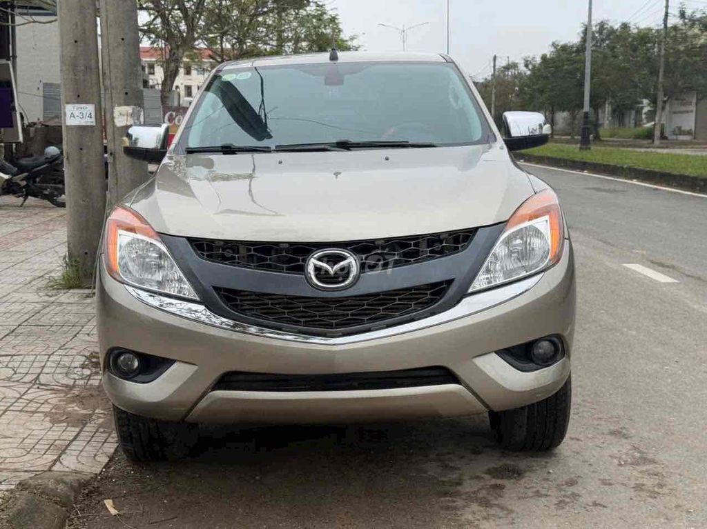 Mazda BT50 2015 Tự động Vàng cát. Mua bán Ô tô tại Quận 12 Tp Hồ Chí Minh được đăng bởi TRƯƠNG CHÍ LÂM hình 7