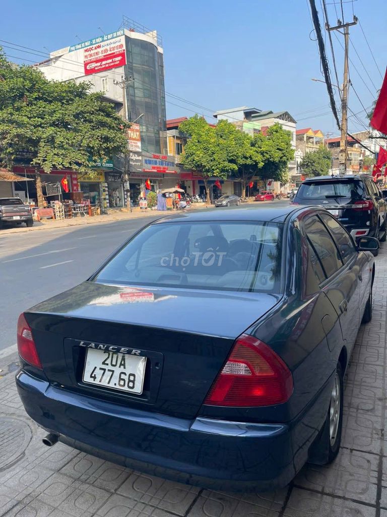 Cần bán Mitsubishi lancer 2002. Xe đẹp. Mua bán Ô tô tại Quận Tây Hồ Hà Nội được đăng bởi Trần Quang Tuân hình 1