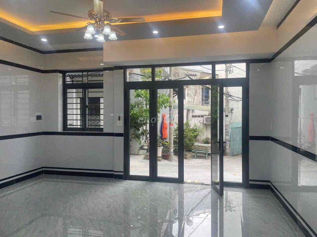 Nhà MỚI DT 5,6x7,3 Nở hậu 6,14, Công Nhận 42m². 20m ra mặt tiền.