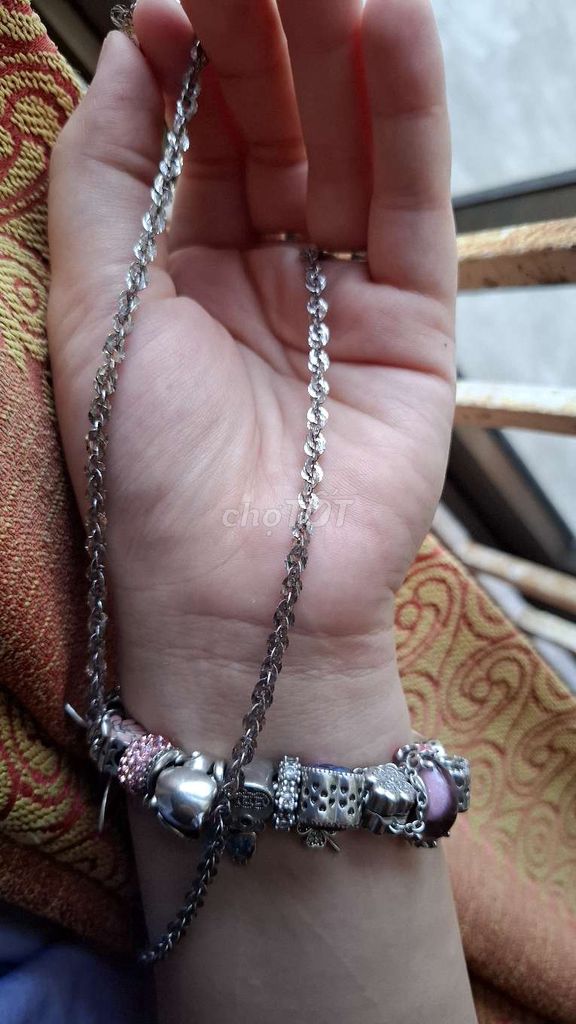 Dây chuyền , lắc tay xoắn bạc xi kim PNJ