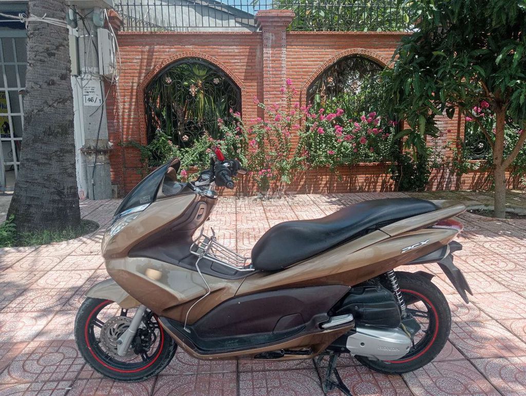 Хонда PCX 2011, золотая бронза