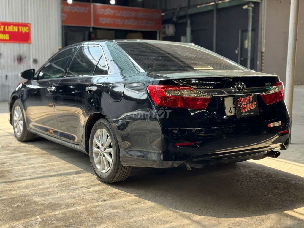 Toyota Camry 2013 2.0E, màu đen, lướt 41.000 km. Mua bán Ô tô tại Quận Bình Tân Tp Hồ Chí Minh được đăng bởi Son Do hình 5