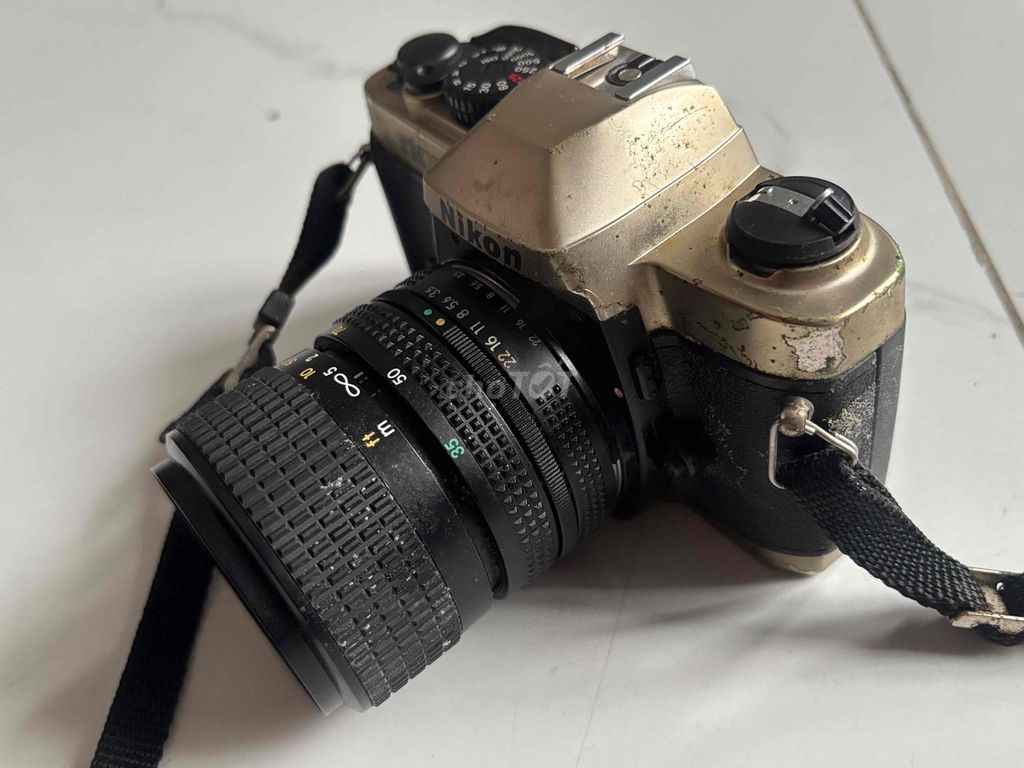 Máy ảnh Nikon FM10 Vàng đồng, Đen. Mua bán Máy ảnh, Máy quay tại Quận 12 Tp Hồ Chí Minh được đăng bởi Bảo Nguyễn hình 1
