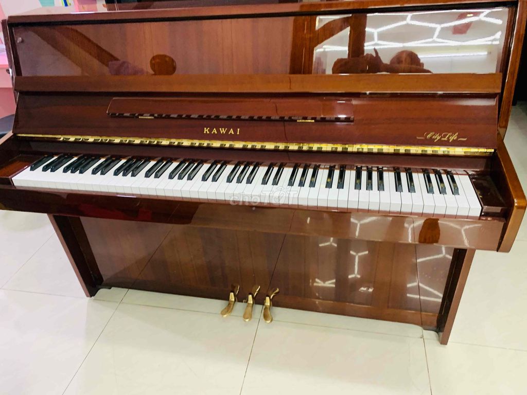 piano cơ Kawai ce7 nguyên cây