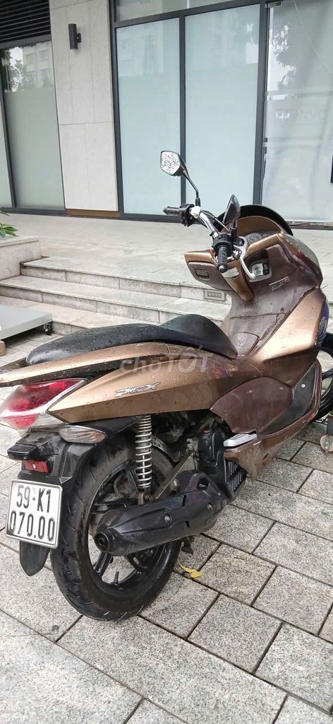 Honda PCX 125cc 2011 màu vàng kim. Mua bán Xe máy tại Quận 7 Tp Hồ Chí Minh được đăng bởi Quí Dương Hùng hình 4