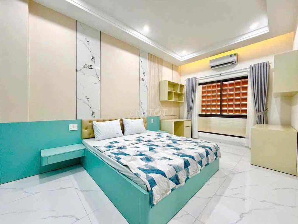 New three-storey riverside house in Hòa Xuân — photo 9