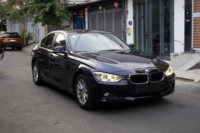 BMW 320i Model 2015 Xanh đen 90000 km