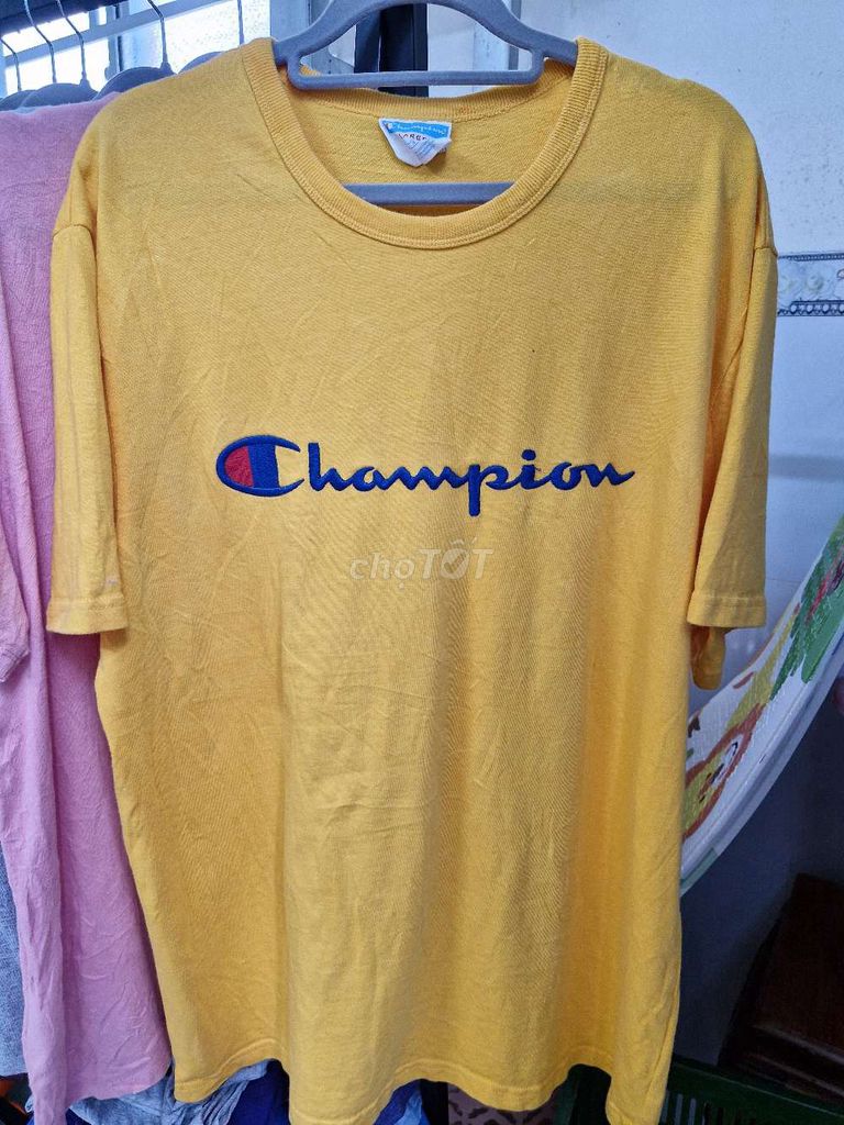 Áo thun Champion Unisex Cotton Vàng L. Mua bán Quần áo tại Quận Bình Thuỷ Cần Thơ được đăng bởi Nguyễn Diễm Trang hình 1
