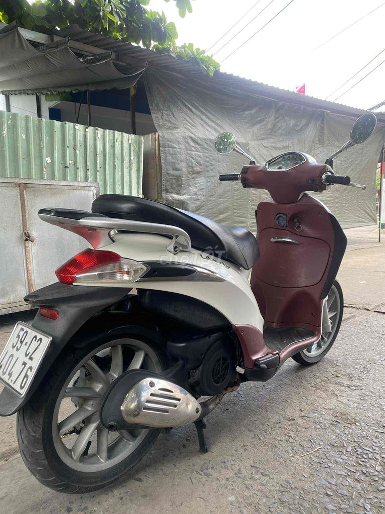 Piaggio Liberty Fi 125 3Vie 2014 trắng Zin100%. Mua bán Xe máy tại Quận Bình Tân Tp Hồ Chí Minh được đăng bởi Anh khuê hình 5