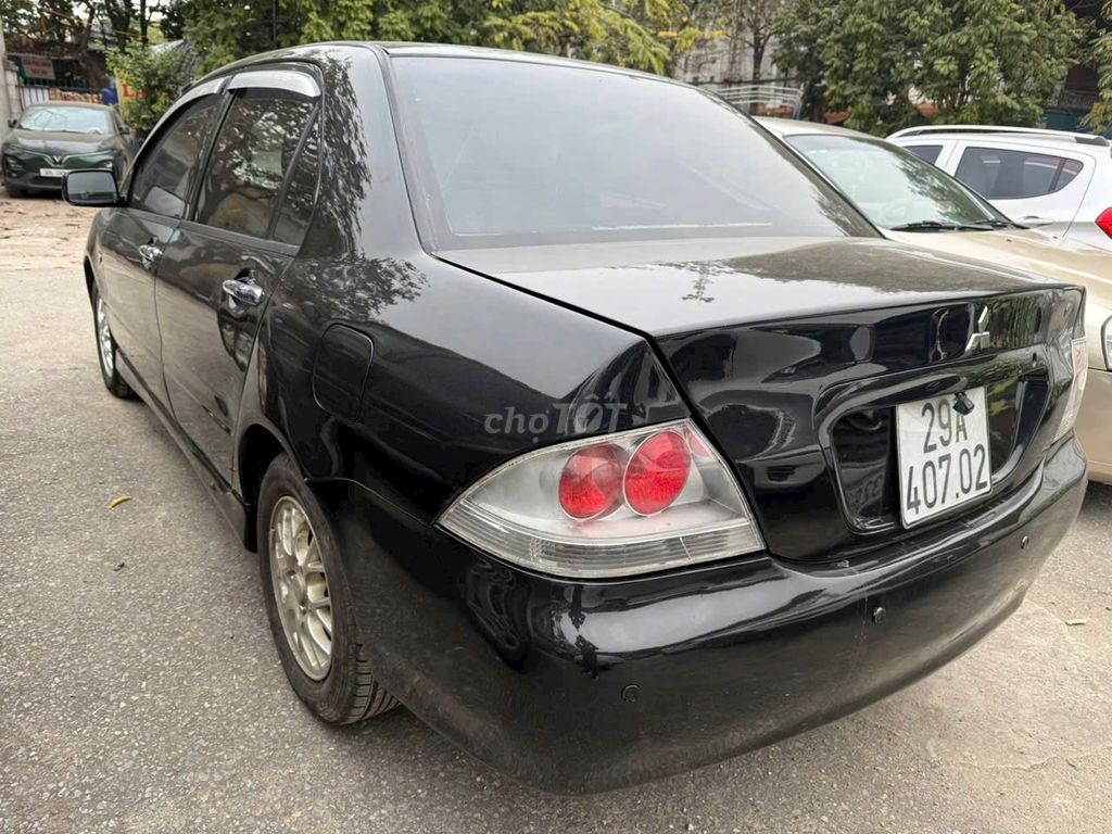 Mitsubishi Lancer 2003 1.6 AT - 250000 km. Mua bán Ô tô tại Quận Nam Từ Liêm Hà Nội được đăng bởi Linh Nguyen hình 7