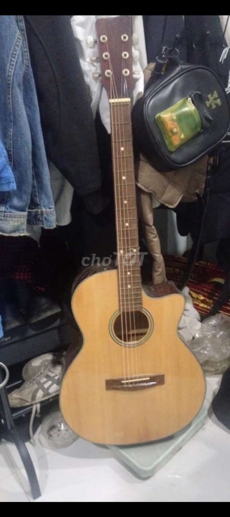 Đàn guitar gỗ màu nâu nhạt ( tặng kèm bao da )