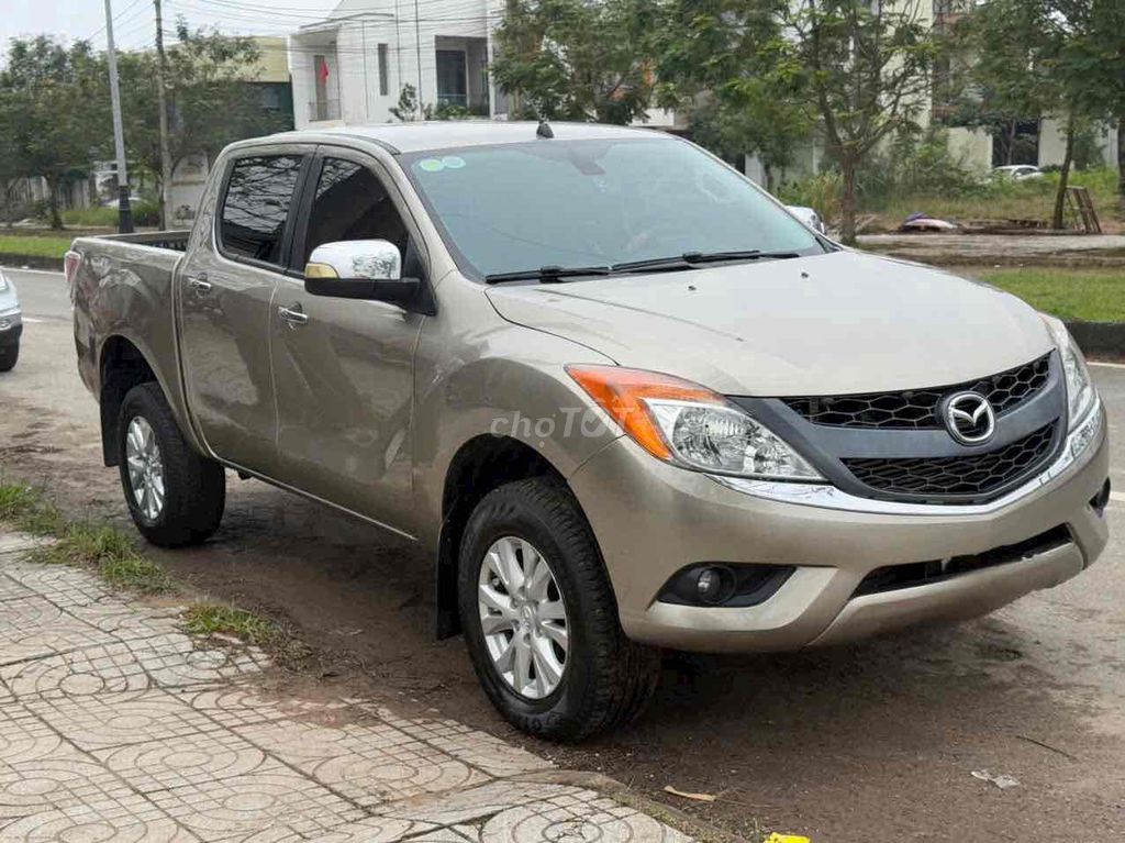 Mazda BT50 2015 Tự động Vàng cát. Mua bán Ô tô tại Quận 12 Tp Hồ Chí Minh được đăng bởi TRƯƠNG CHÍ LÂM hình 2