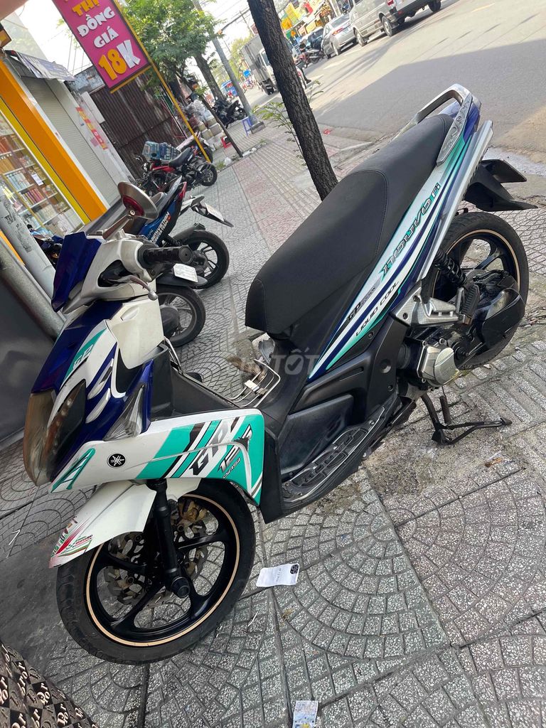 Yamaha Nouvo 5 Fi Trắng Xanh Đen biển số thành phố. Mua bán Xe máy tại Quận 12 Tp Hồ Chí Minh được đăng bởi Minh Chính hình 2